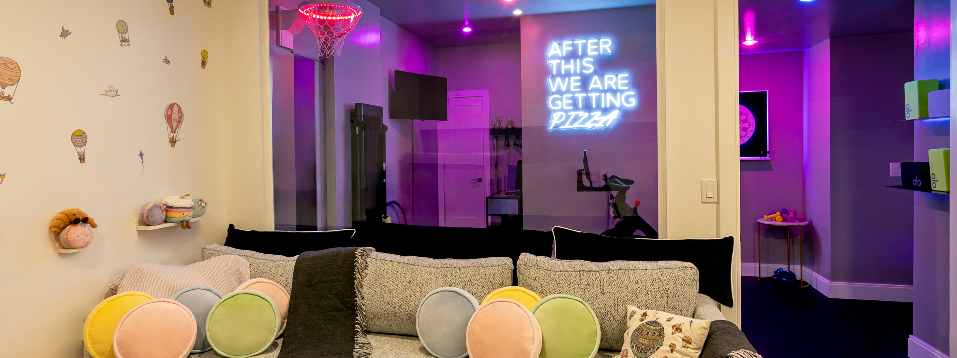A-Glo Gym: a New Jersey basement home gym and dress-up studio styled like a department store window