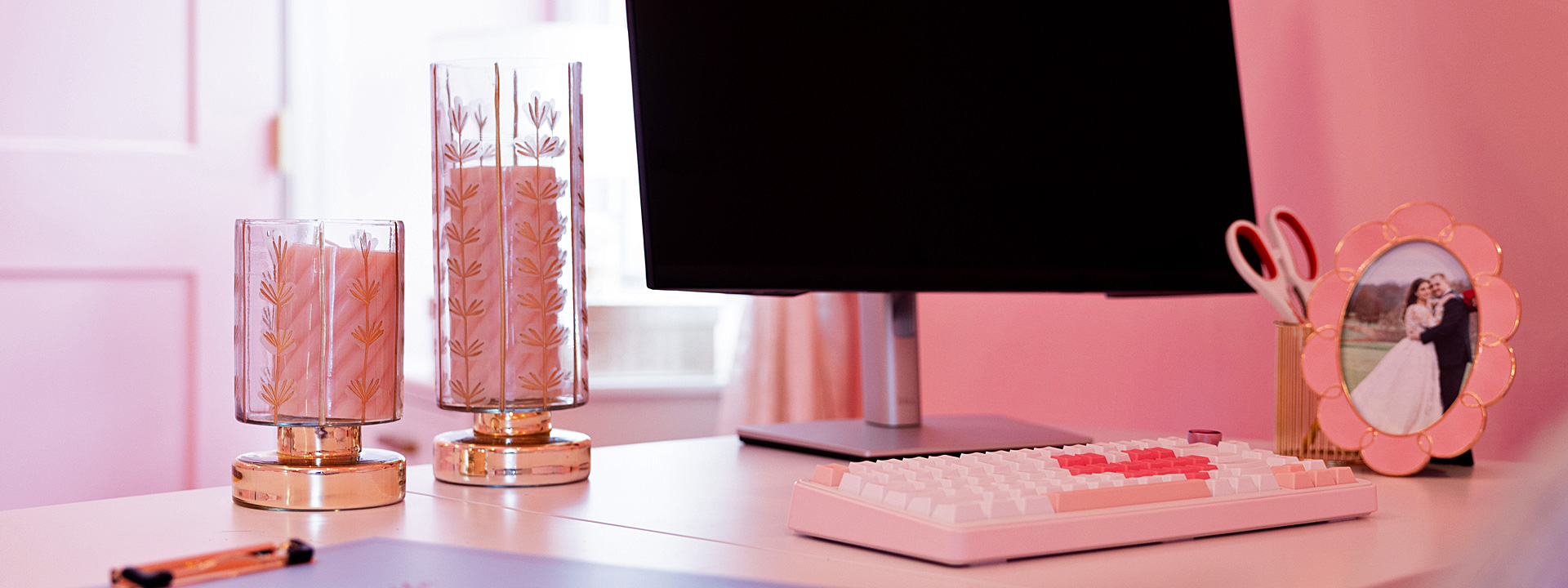 Little Pink Office: a pink home office desk with patterned glass lamps and a pink keyboard