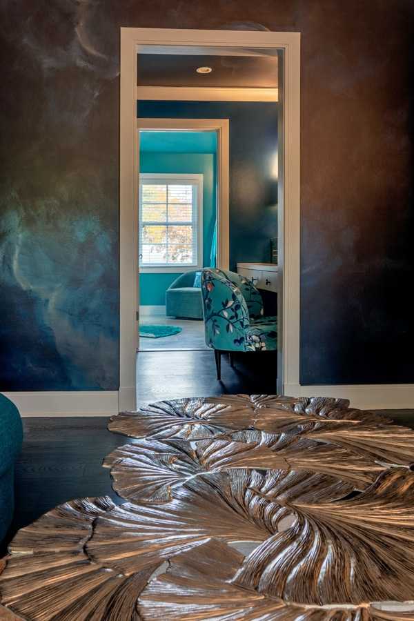 Dresser against clouded walls with velvet drapery