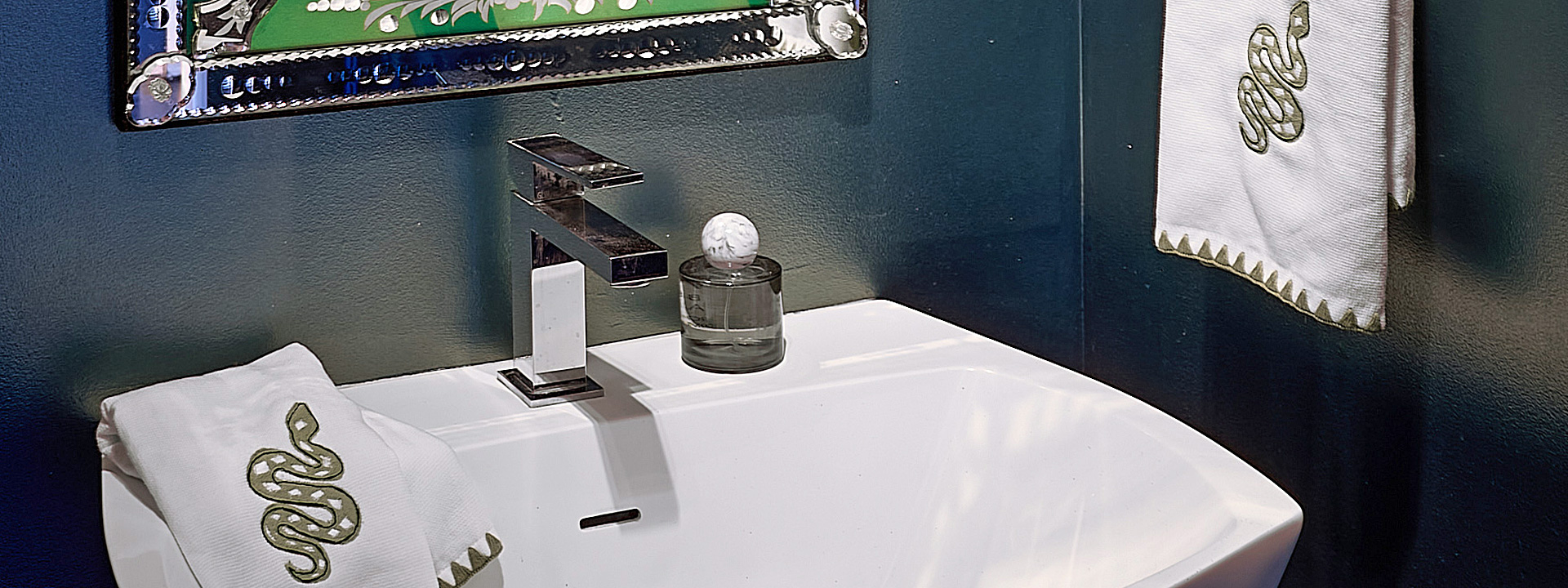 Mystical Magical Powder: a New Jersey powder room drenched in metallic paint with a modern Venetian glass mirror