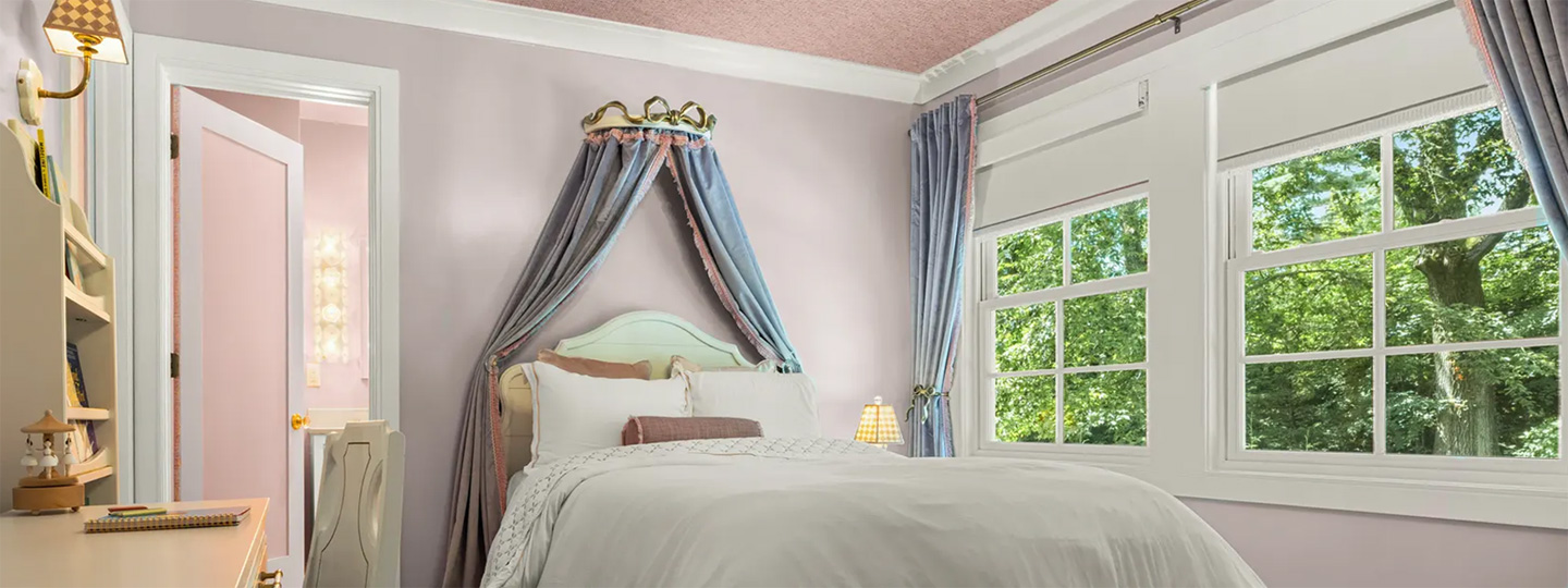 Polly&rsquo;s Penthouse: a whimsical girl&rsquo;s bedroom layered with storage, sconces and family pieces